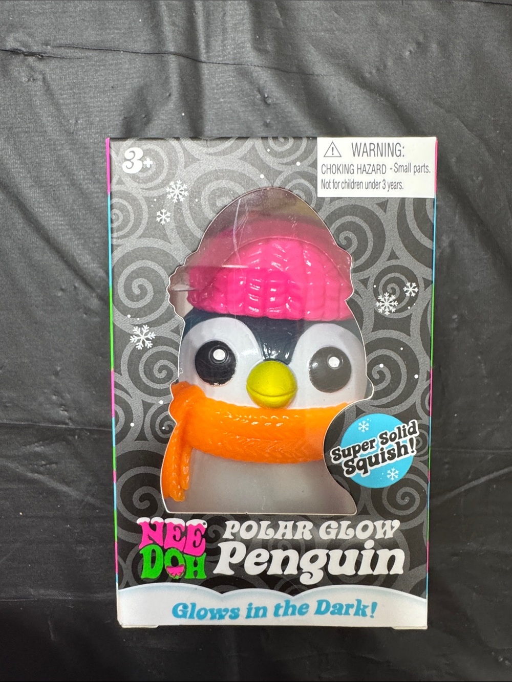 NeeDoh Polar Glow Penguin Blue Kids Toy - Pink Hat & Orange Scarf